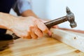 To make repairs. Installing a new skirting board. Royalty Free Stock Photo