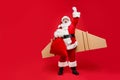 To the moon and back. Full body photo of crazy funny super santa hurry to give presents on his turbo airplane craft