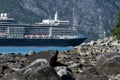 a big cruise liner is passing a narrow place in the Glacier Bay - Alaska Royalty Free Stock Photo