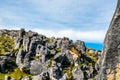 Check out the group of rock climbers centre screen on the peak at Castle Hill