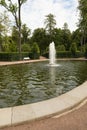 Petergof, Russia, July 2019. The fountain in the center of the green labyrinth in the park.