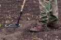 To seek treasures on earth with a metal detector