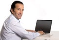 40 to 50 years old senior businessman working on computer at office desk looking confident and relaxed Royalty Free Stock Photo