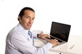 40 to 50 years old senior businessman working on computer at office desk looking confident and relaxed Royalty Free Stock Photo