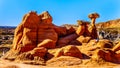 Toadstool Hoodoos against the background of the colorful sandstone mountains in Grand Staircase-Escalante Monument Royalty Free Stock Photo
