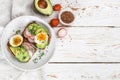 Toast with avocado, radish, egg and flax seeds Royalty Free Stock Photo