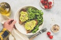 Toast with avocado, seeds served with green salad