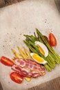 Toast with baked asparagus, boiled egg (top view) Royalty Free Stock Photo