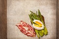 Toast with baked asparagus, boiled egg (top view) Royalty Free Stock Photo