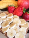 Toast with bananas and strawberries for breakfast Royalty Free Stock Photo