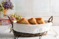 Toast bread in basket on white wooden table Royalty Free Stock Photo