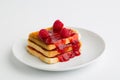 Toast bread with raspberry jam on plate