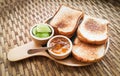 toast bread served wooden tray with sweet jam and lime homemade breakfast Royalty Free Stock Photo