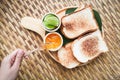 Toast bread served wooden tray with sweet jam and lime homemade breakfast Royalty Free Stock Photo