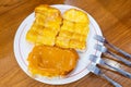 Toast with butter sweetened condensed milk, sugar and thai tea c Royalty Free Stock Photo