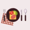 Toast with cheese, salami, butter, tomato and green salad served on a plate with fork, knife, spoon and napkin. Healthy food.