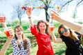 Toast with child champagne on birthday garden party - plastic cups