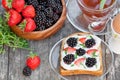 Toast with cream cheese and fresh berries Royalty Free Stock Photo