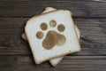 Toast with a footprint sign on dark wood