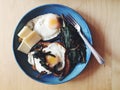 Toast, fried eggs with cheese and sauteed ramps (wild leeks) Royalty Free Stock Photo