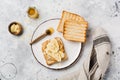 Toast with peanut butter, banana slices, honey and almond flakes on an old gray concrete background. Royalty Free Stock Photo