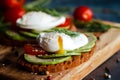 Toast with poached eggs, tomatoes, avocado, spices and herbs Royalty Free Stock Photo