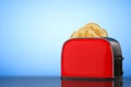 Toast popping out of Vintage Red Toaster. 3d Rendering Royalty Free Stock Photo