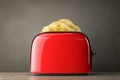 Toast popping out of Vintage Red Toaster. 3d Rendering Royalty Free Stock Photo