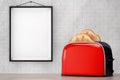 Toast popping out of Vintage Red Toaster in front of Brick Wall Royalty Free Stock Photo