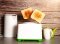Toast pops out of the toaster, morning breakfast in the kitchen, fried bread health benefits