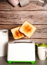 Toast pops out of the toaster, morning breakfast in the kitchen, fried bread health benefits