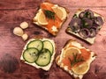 Toast sandwiches with smoked salmon, cream cheese and cucumber.