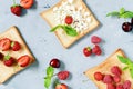 Toast with strawberries, raspberries, cherries, mint and cottage cheese for breakfast. Healthy breakfast, Ruddy bread toast. Royalty Free Stock Photo