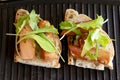 Toast with wurstel and green salad
