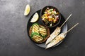 Toast with zucchini grill and salad of olives, cucumbers, tomato, sweet red onion, yellow chili pepper with grilled Royalty Free Stock Photo