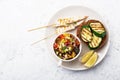 Toast with zucchini grill and salad of olives, cucumbers, tomato, sweet red onion, yellow chili pepper with grilled Royalty Free Stock Photo