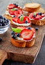 Toasted bread with berries and cream cheese Royalty Free Stock Photo