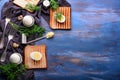 Toasted bread with boiled eggs and herbs on color wooden table Royalty Free Stock Photo