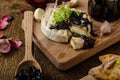 Toasted bread with brie cheese and caramelized onions Royalty Free Stock Photo