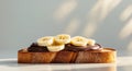 Toasted Bread with Chocolate Spread and Fresh Banana Slices Royalty Free Stock Photo