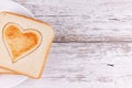 Toasted bread cutted heart, Happy Valentine`s Day concept, breakfast with love
