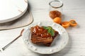 Toasted bread with delicious apricot jam on plate Royalty Free Stock Photo
