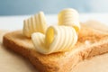 Toasted bread with fresh butter curls Royalty Free Stock Photo