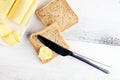 Toasted bread with fresh butter curls. margarine or spread, natural dairy product on breakfast bread Royalty Free Stock Photo