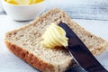 Toasted bread with fresh butter curls. margarine or spread, natural dairy product on breakfast bread Royalty Free Stock Photo