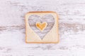 Toasted bread hearts, concept of growing love sense and Happy Valentine`s Day