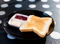 Toasted bread, jam and butter Royalty Free Stock Photo