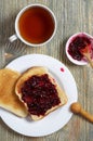 Toasted bread with jam and tea Royalty Free Stock Photo