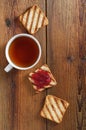 Toasted bread with jam and tea Royalty Free Stock Photo