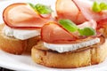 Toasted bread with serrano ham and fresh cheese Royalty Free Stock Photo